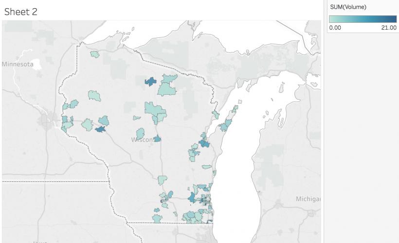 A sparse, Tableau-generated map of Wisconsin measuring sales by volume in the state of Wisconsin. The map includes the state outline and blue-filled zip codes that indicate sales volume.