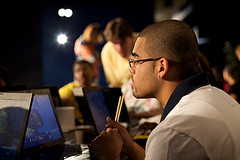 Student staring intently at a computer screen.